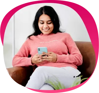 A woman typing her opinion on ObvioHealth clinical trial app