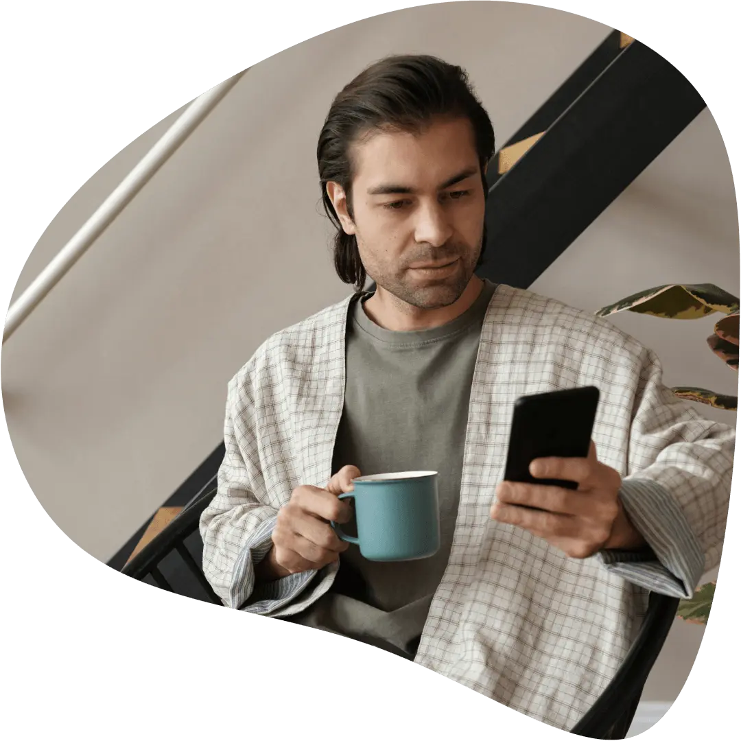 A patient using smartphone to report clinical trial outcomes