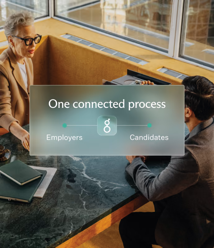 Two people seated at a green marble table near a window, with an overlay text reading 'One connected process' linking 'Employers' on the left and 'Candidates' on the right.