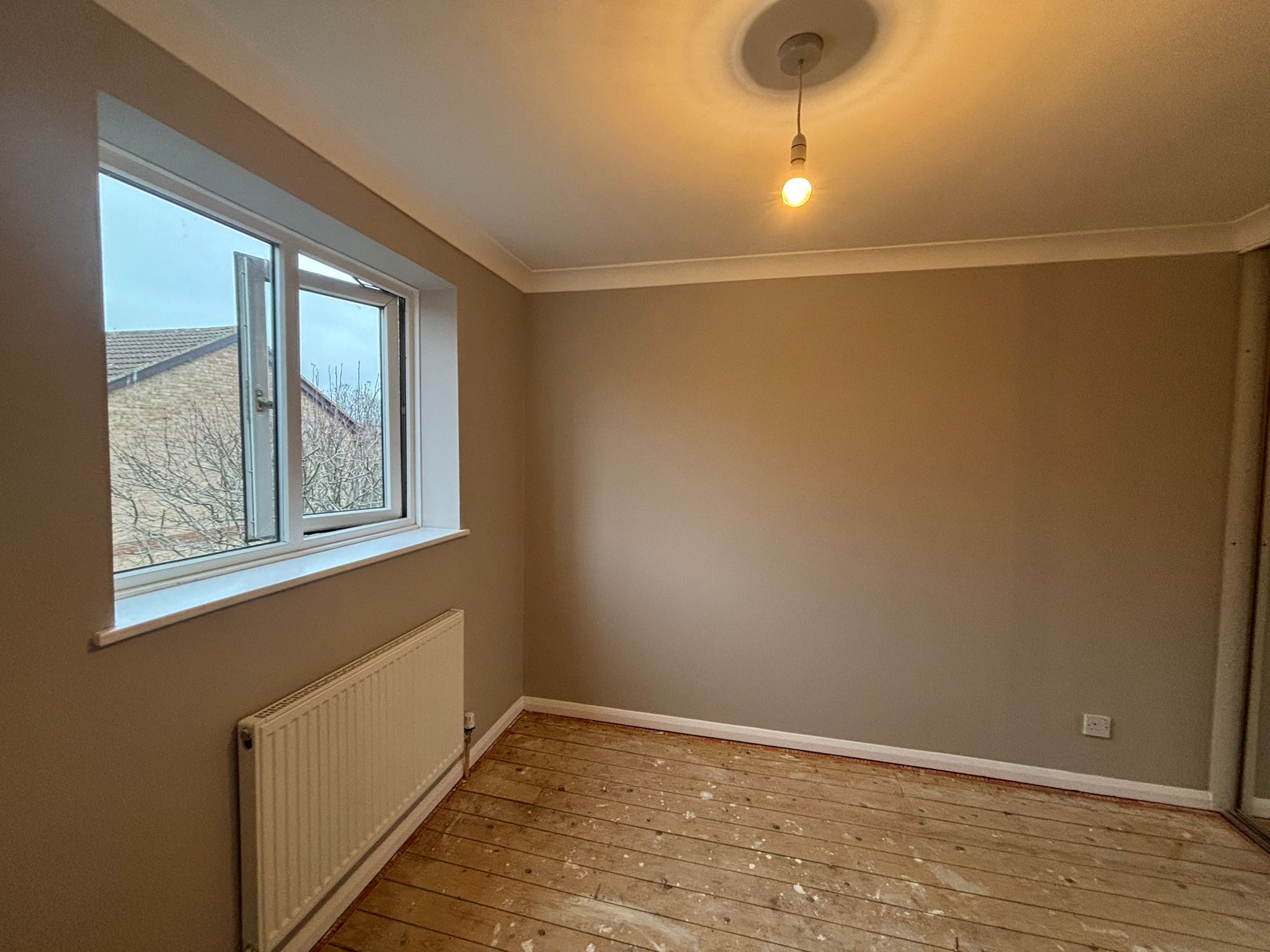 Ceiling skimmed flat with walls painted in a durable matt