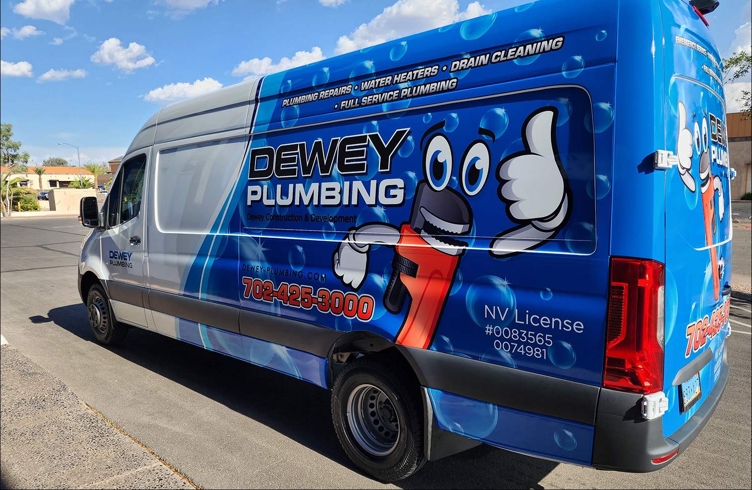 Team Acme auto glass technician working on windshield replacement in Henderson NV