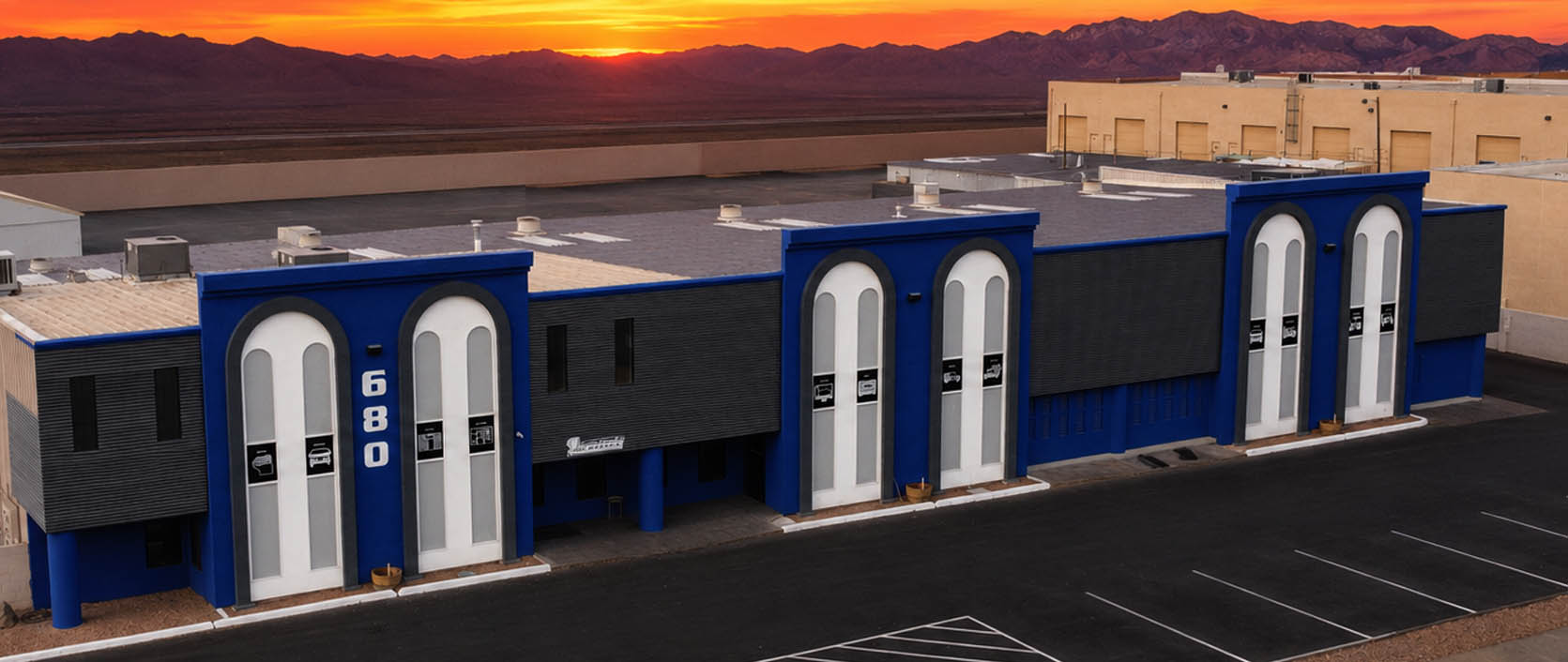 Front exterior of the Team Acme building in Henderson, Nevada, showing the company entrance and building facade