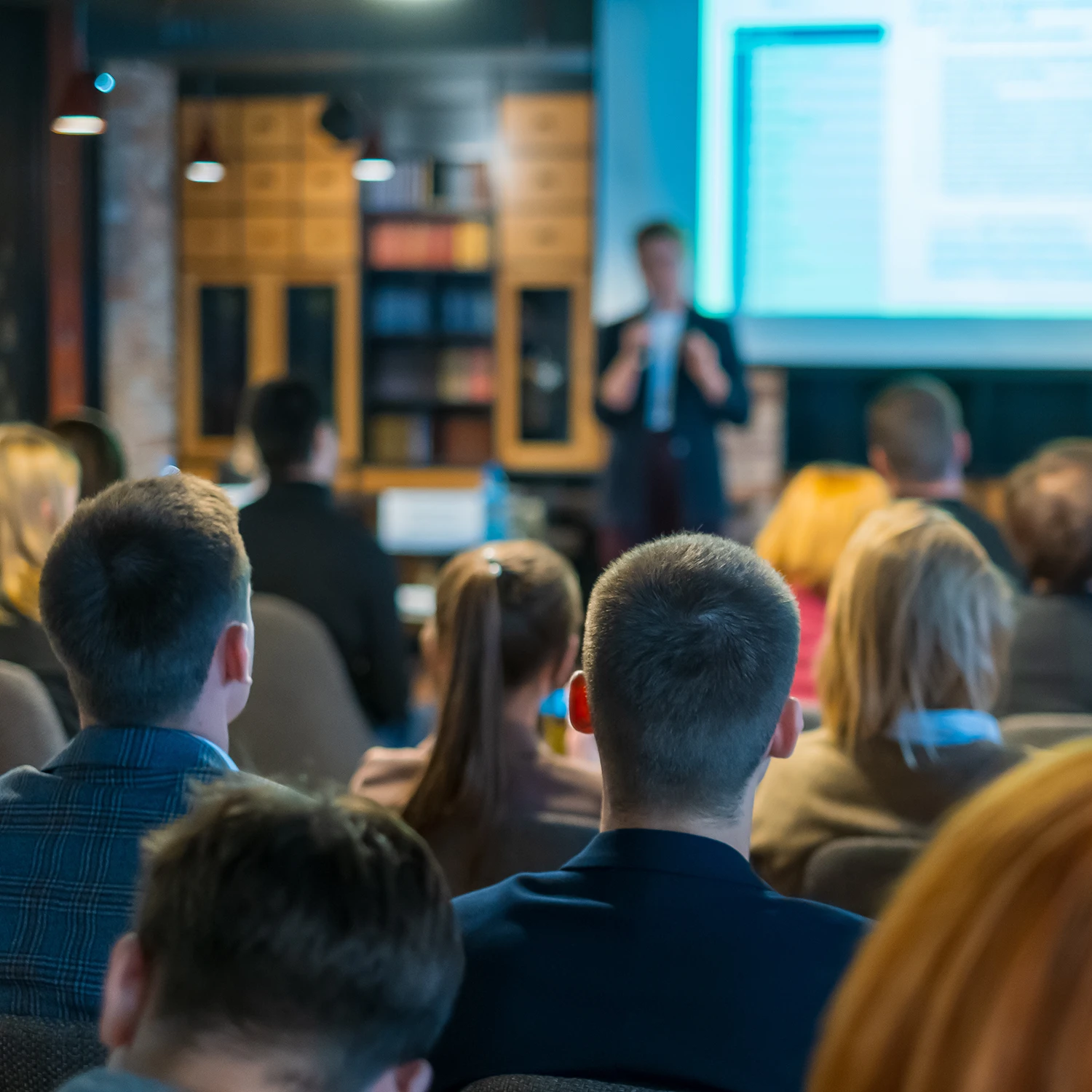 Investors in a conference room listening to a presentation