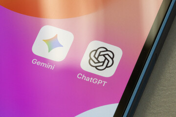 Portland, OR, USA - Sep 5, 2025: Gemini and ChatGPT app icons are seen on the screen of an iPhone. AI competition and Google's Gemini vs OpenAI's ChatGPT concepts.