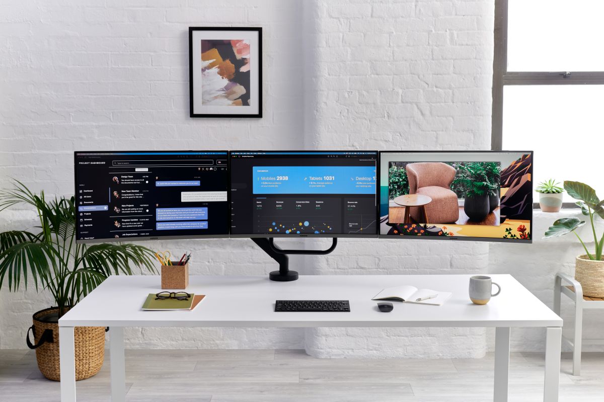 Wide computer screen on a stand