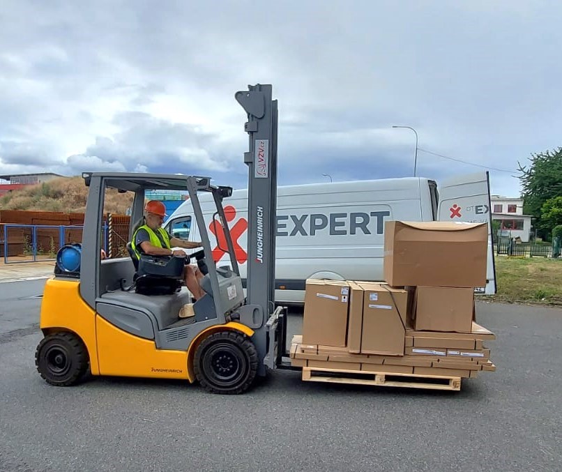 Forklift moving boxes