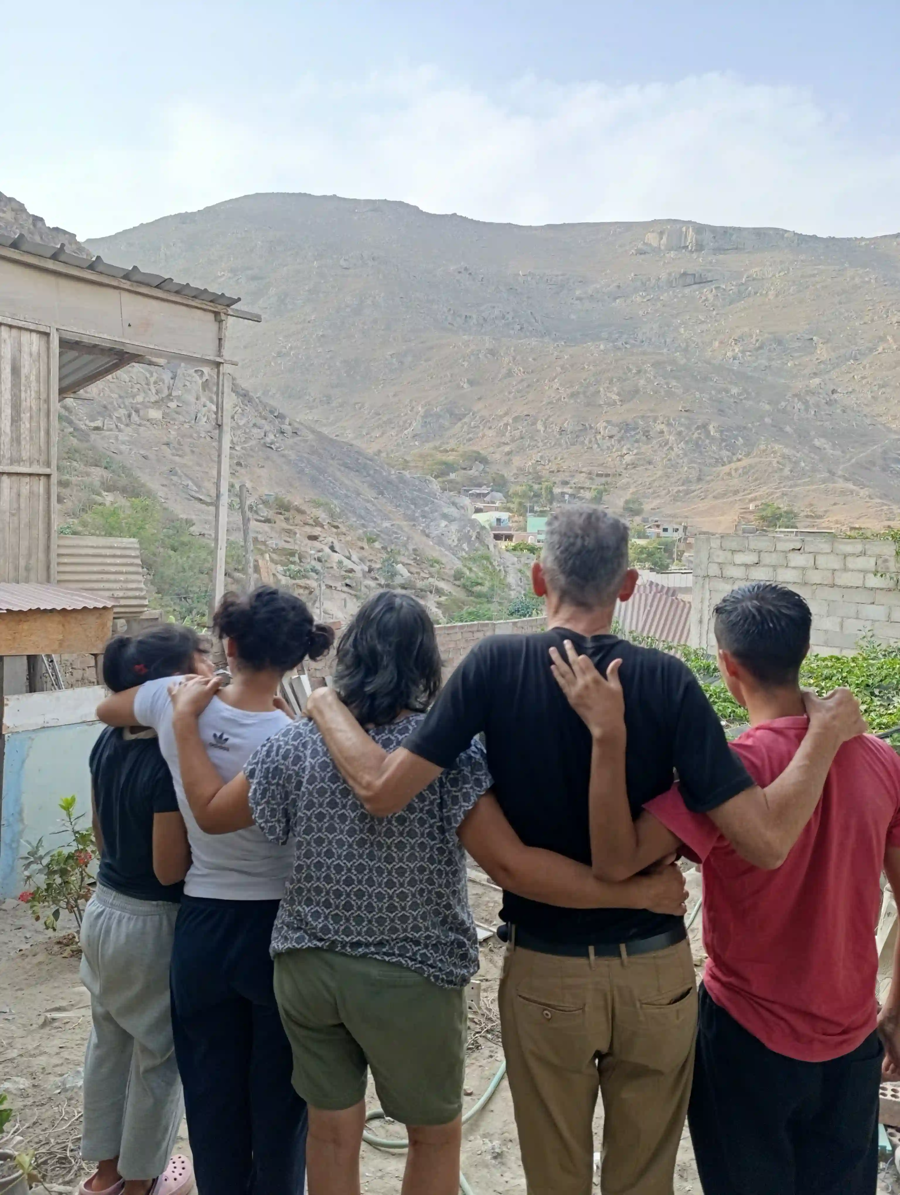 A family hugging together.