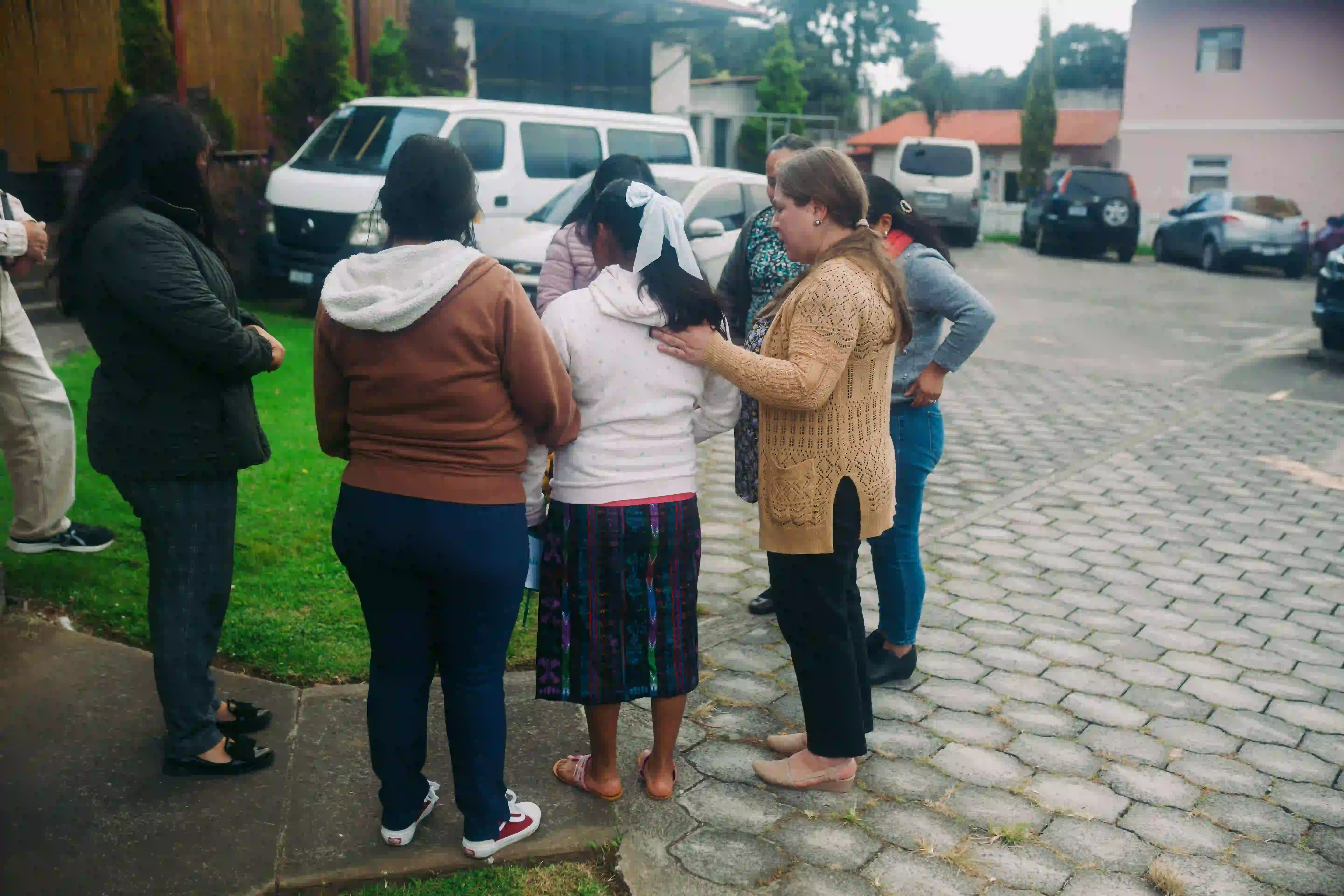 A girl in protective care meeting her aunt with her social work team.