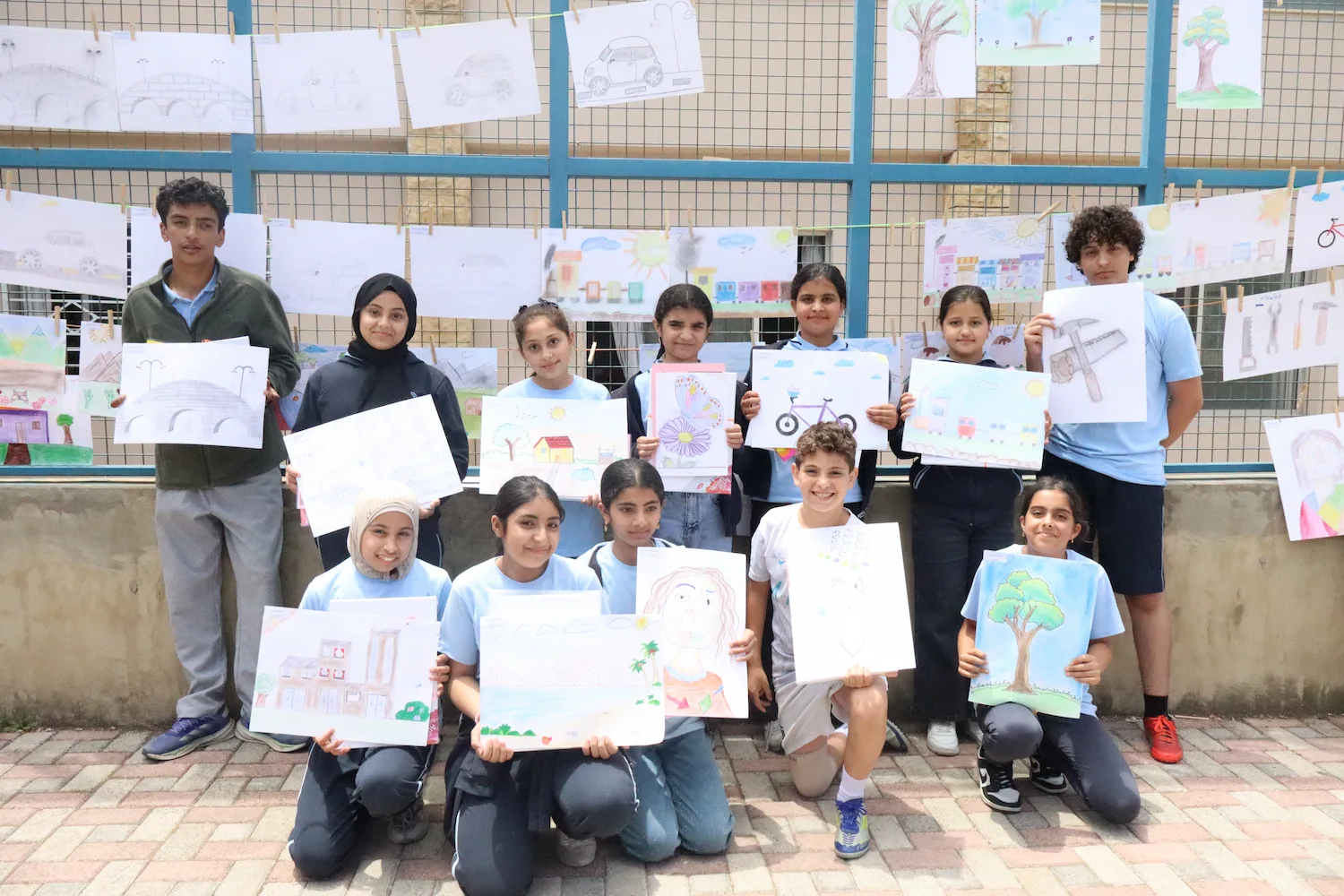 Classmates displaying God's truth: I am Art