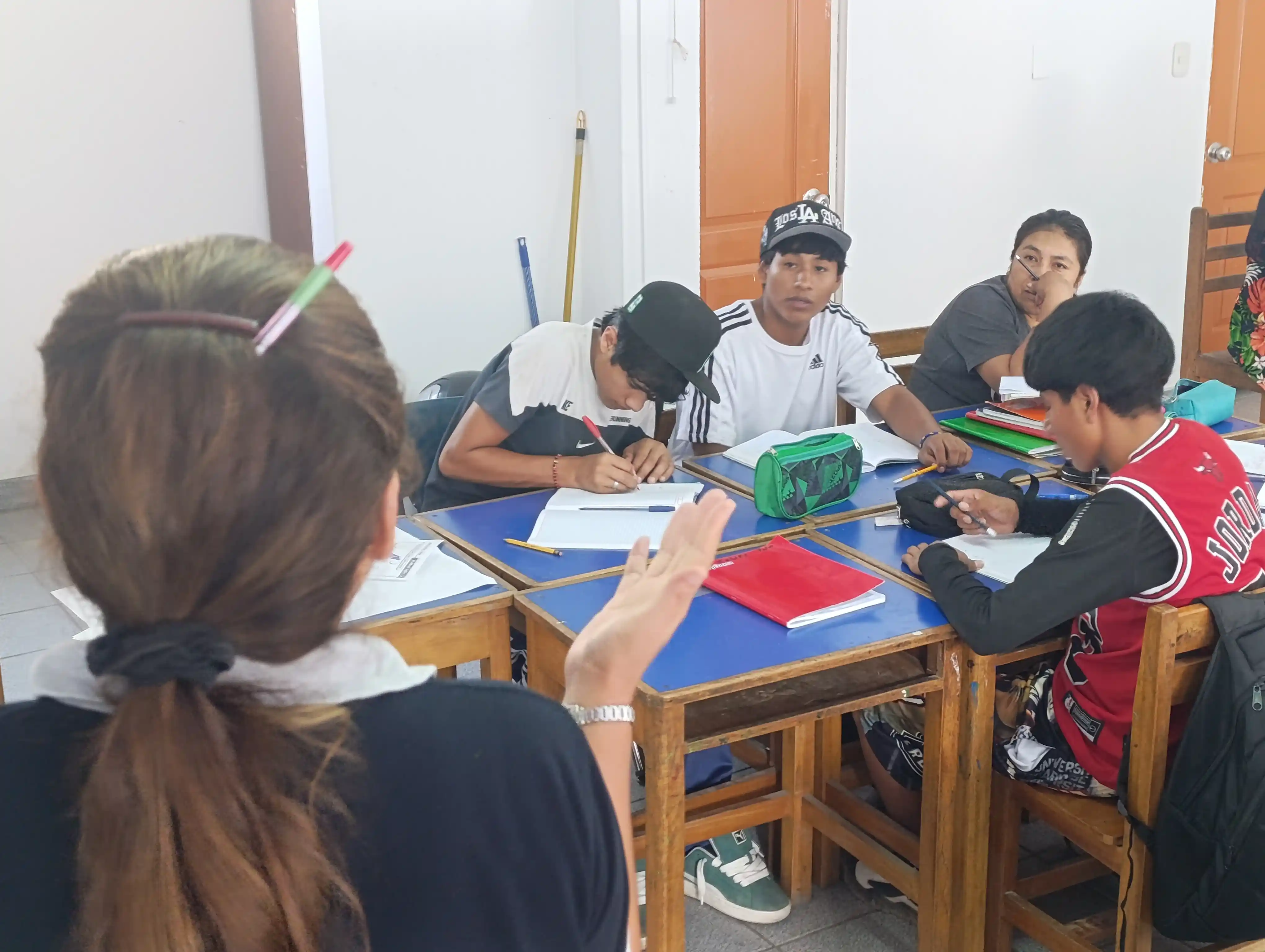 Hugo learning with peers at a Kids Alive Peru Restorative Education program.