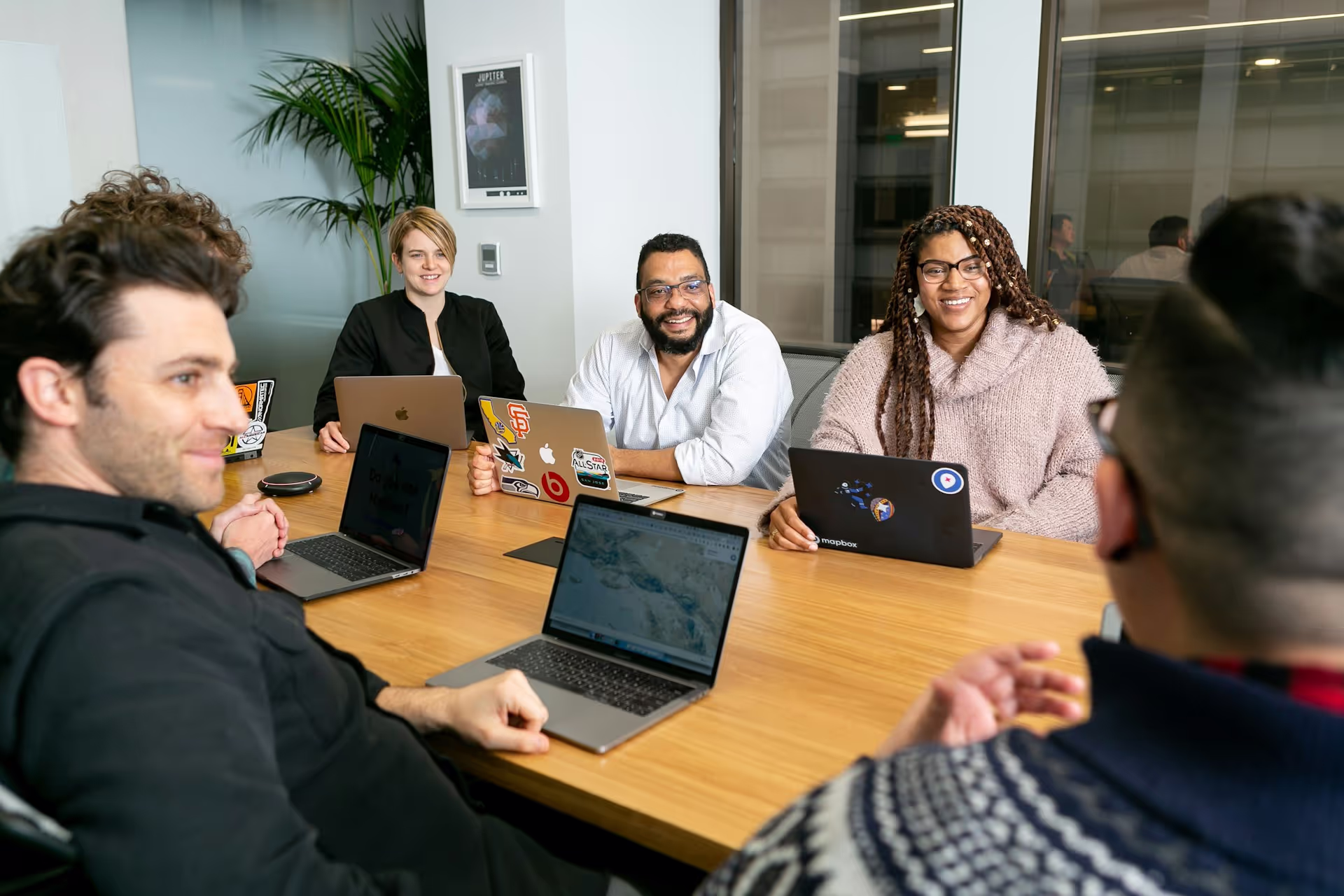Brightter web team working together in a conference room