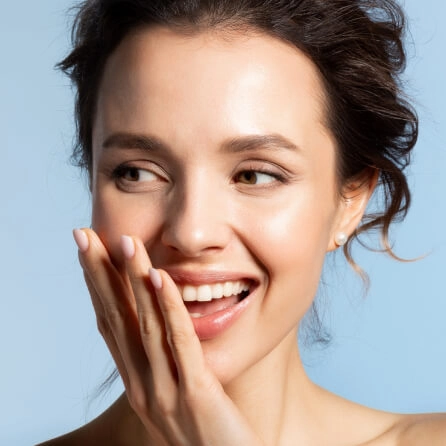 Smiling woman after professional teeth whitening treatment at a Myrtleford dentist in Australia.