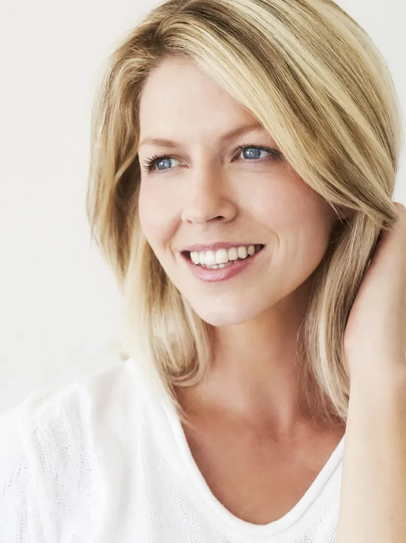 Smiling woman after dental procedure at a Myrtleford dentist in Australia.