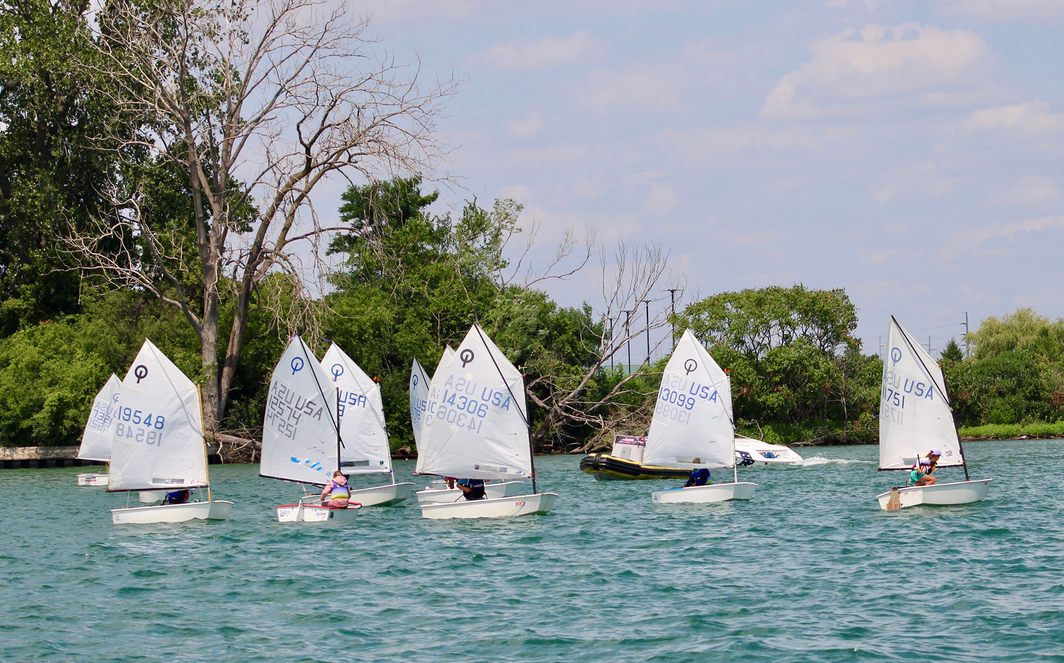 Kids sailing in regatta - Optimist Dinghy