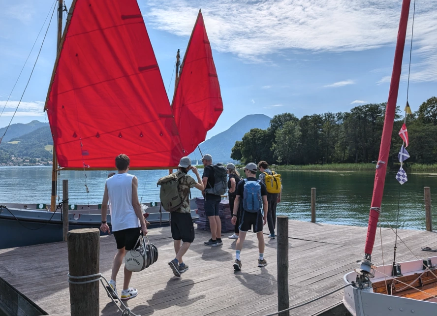 Employees by a lake