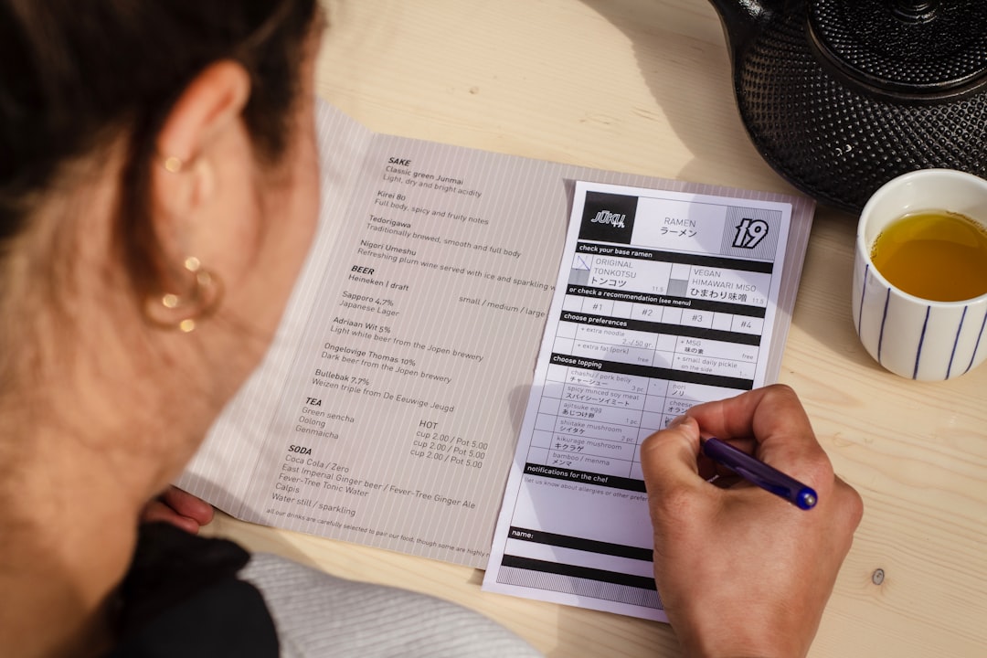 person reviewing a dental insurance form - where to get emergency dental care near me