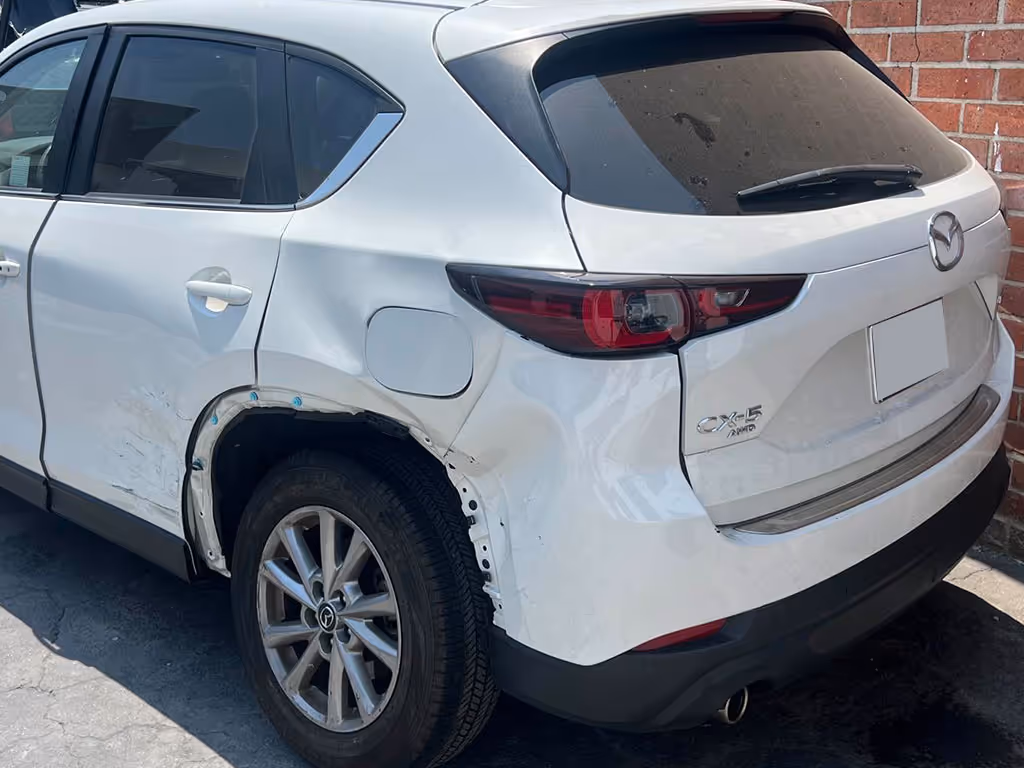 Mazda Rear Left Collision Damages