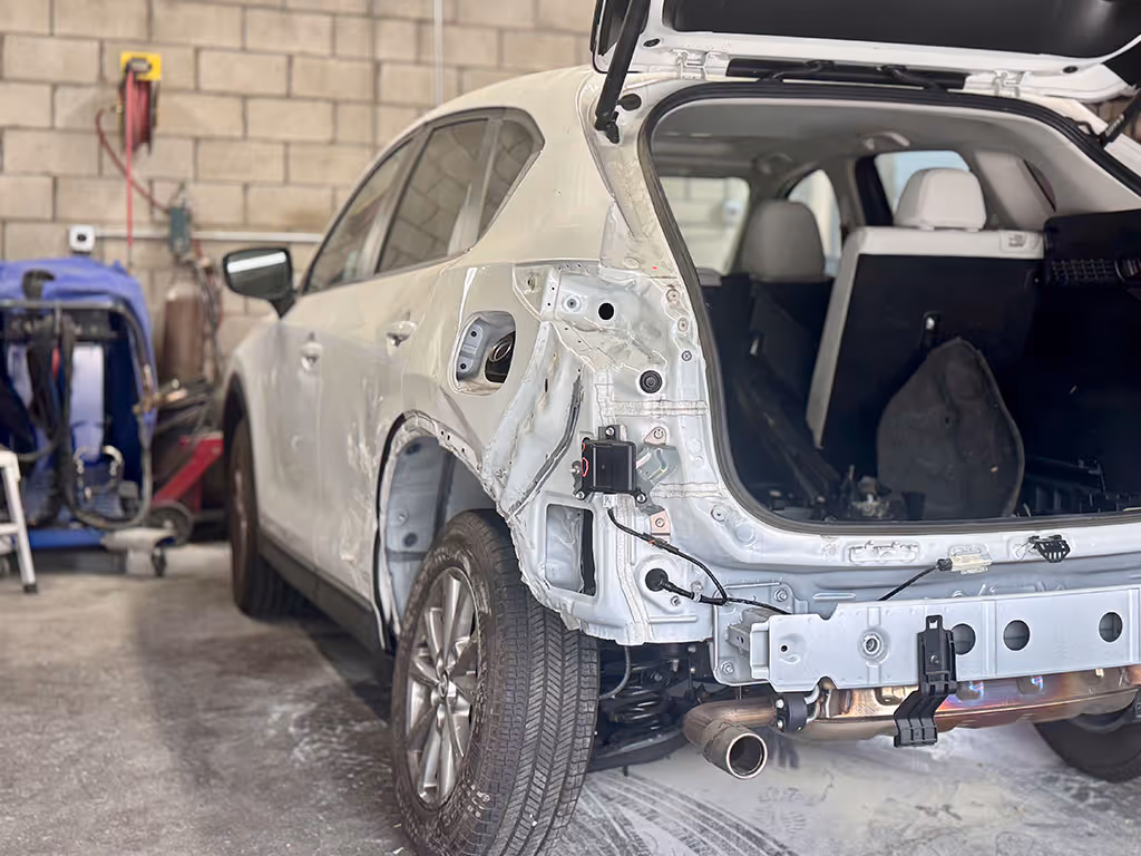 Mazda damages 
