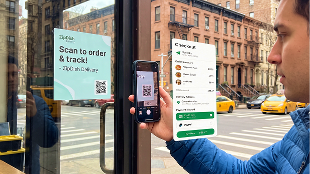 Man scanning a storefront QR code to order on his phone
