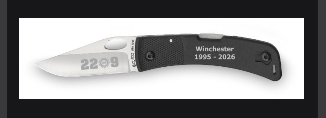 Union made folding pocket knife with a stainless steel blade and black textured engraved handle
