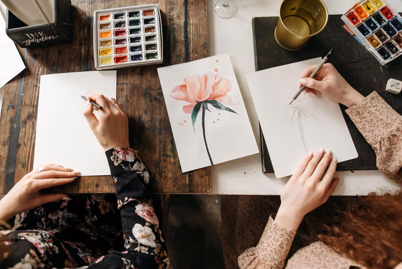 Women Drawing on White Paper