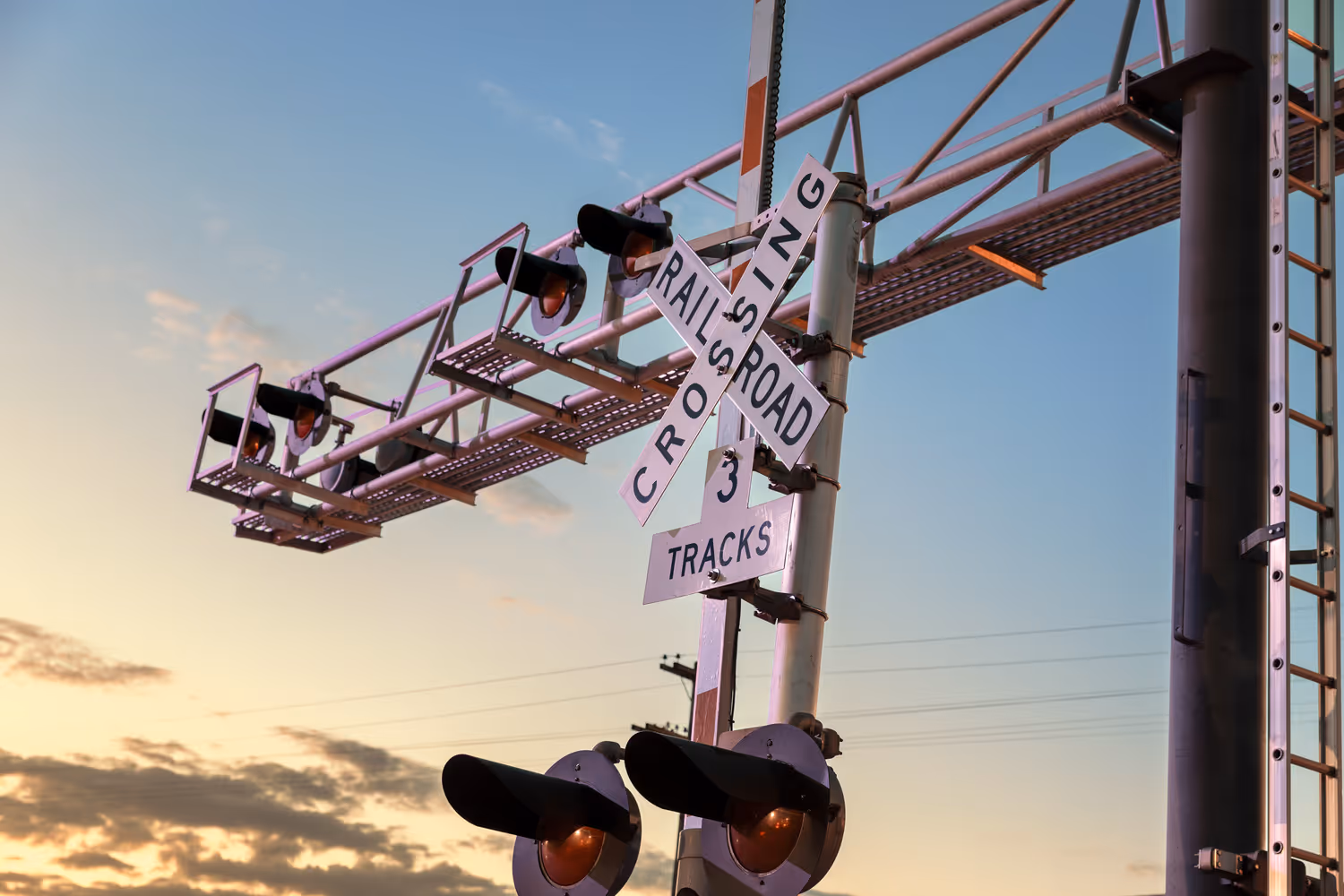 The crossbuck railroad crossing sign traces its roots to the skull-and-crossbones warnings common at crossings in the early 20th century.