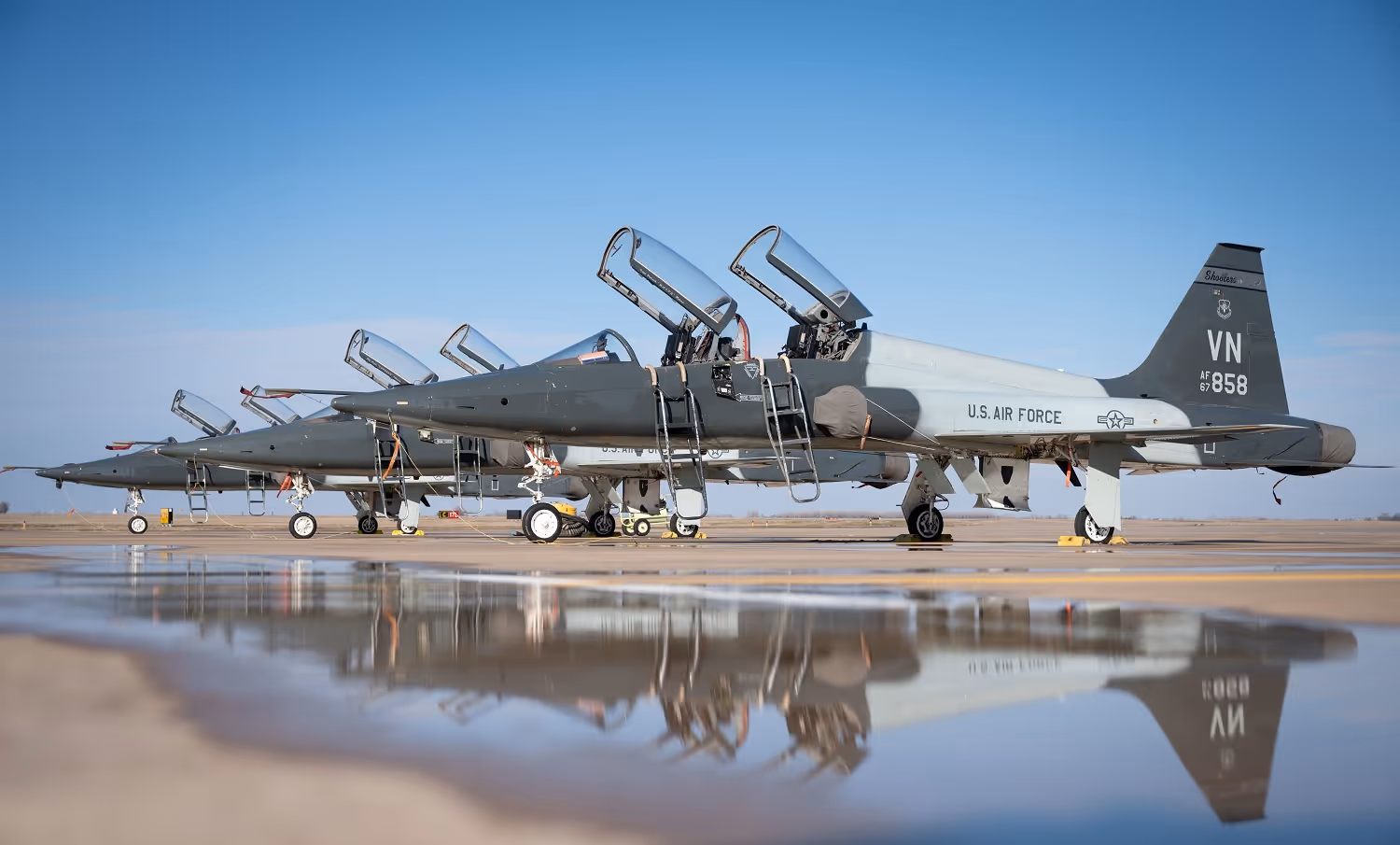 T-38C Talon jets dry out following a downpour on the flightline at Vance Air Force Base. Olsson was part of a project team that identified drainage issues at Vance AFB and Kegelman Air Force Auxiliary Field and proposed solutions to address the issues. (U.S. Air Force photo by Airman 1st Class Kathy Duran)
