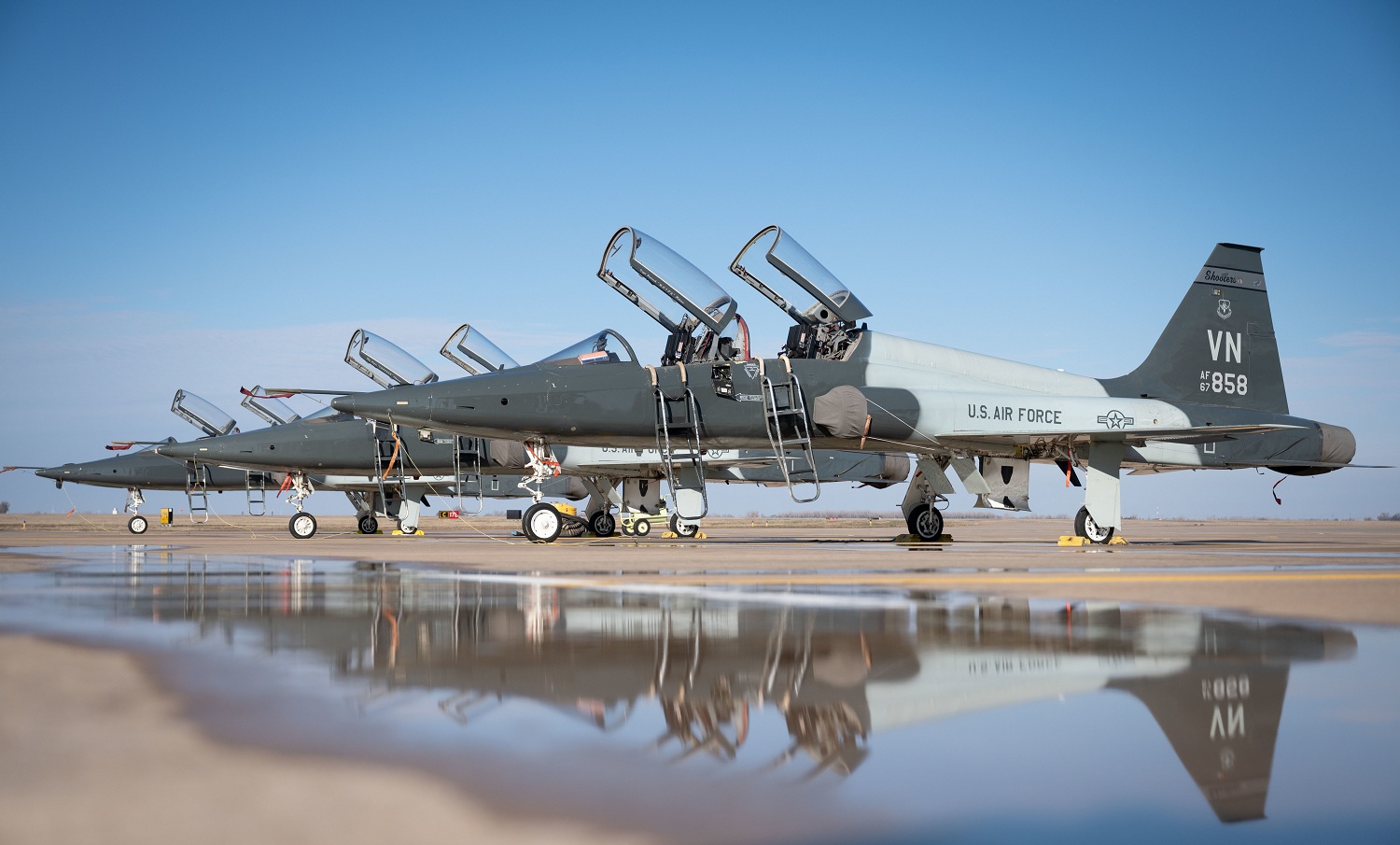 T-38C Talon jets dry out following a downpour on the flightline at Vance Air Force Base. Olsson was part of a project team that identified drainage issues at Vance AFB and Kegelman Air Force Auxiliary Field and proposed solutions to address the issues. (U.S. Air Force photo by Airman 1st Class Kathy Duran)