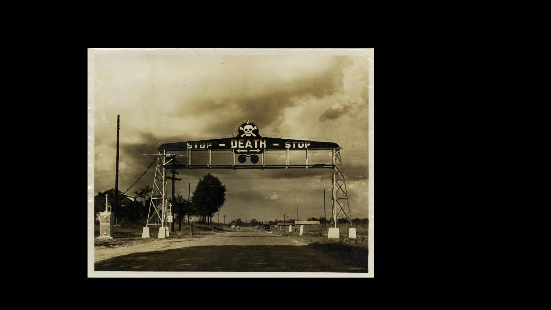 The skull-and-crossbones signal at an Illinois Central Railroad crossing in Grenada, Mississippi, in 1936. (Courtesy of the Mississippi Department of Archives & History) 