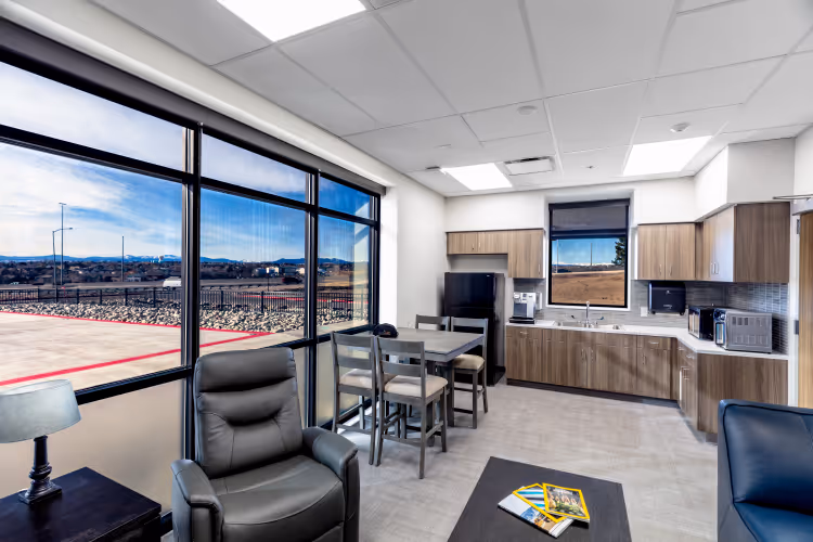 The project features an indoor workspace for staff who support air ambulance operations. 