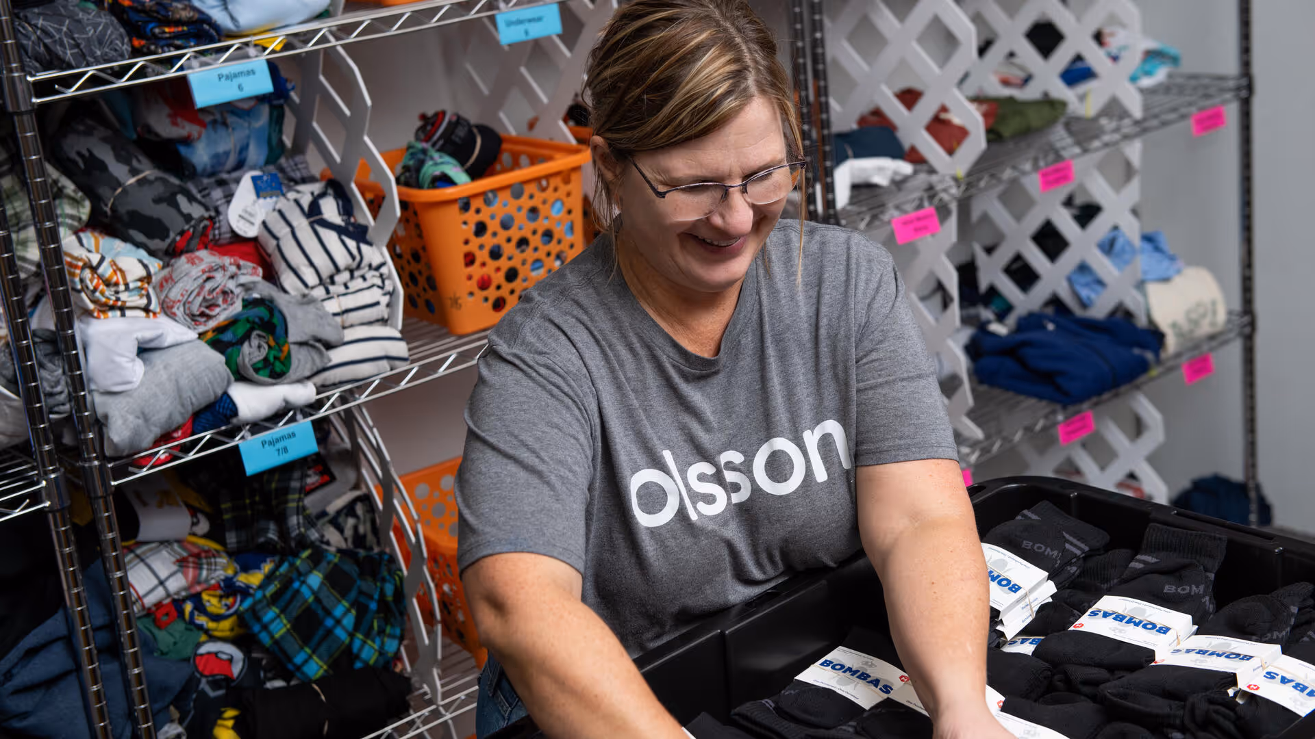 Debbie Klisis is one of many Olsson employees who has volunteered with Packs of Hope. She says, “It’s so rewarding because what you do directly affects those around you, your community, and your neighbors."