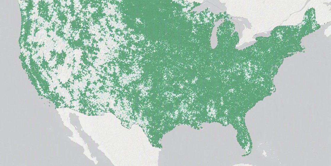 Much of the rural United States lacks strong digital infrastructure. Areas with limited or non-existent broadband connections are represented by the light green and gray shading on this FCC map. 