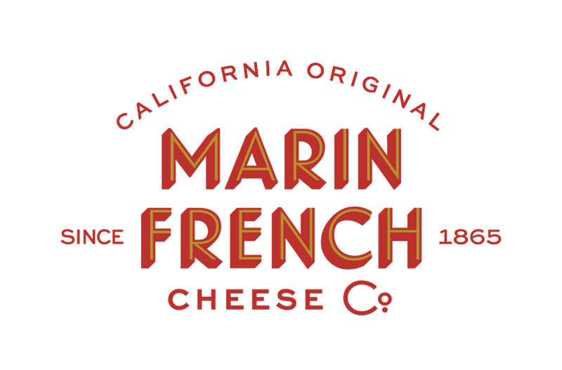 Marin French logo with stylized golden text on a red rectangular background.