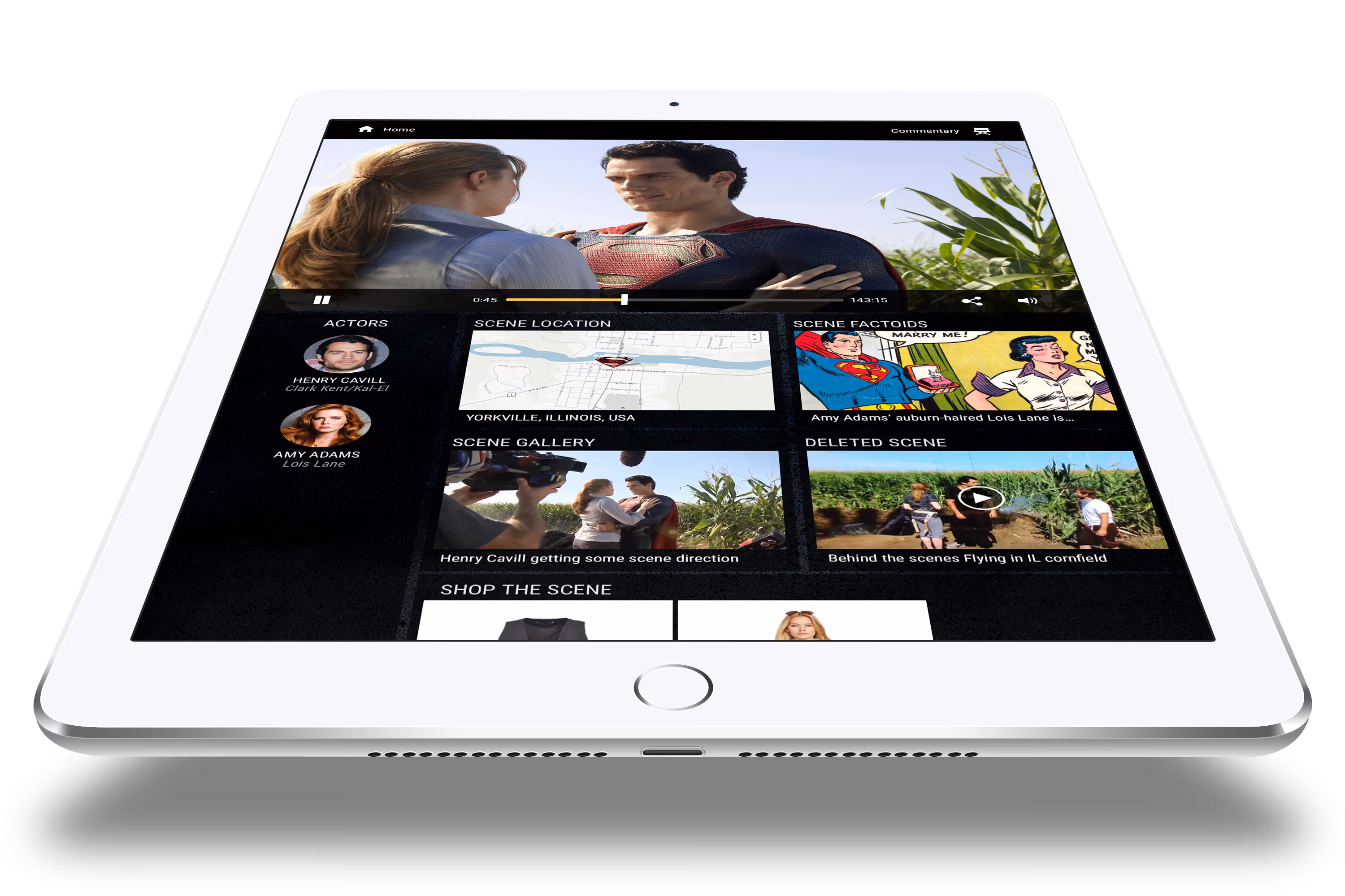 Tablet displaying video scene with Superman and Lois Lane, actors, map, scene gallery, factoids, and deleted scene sections.