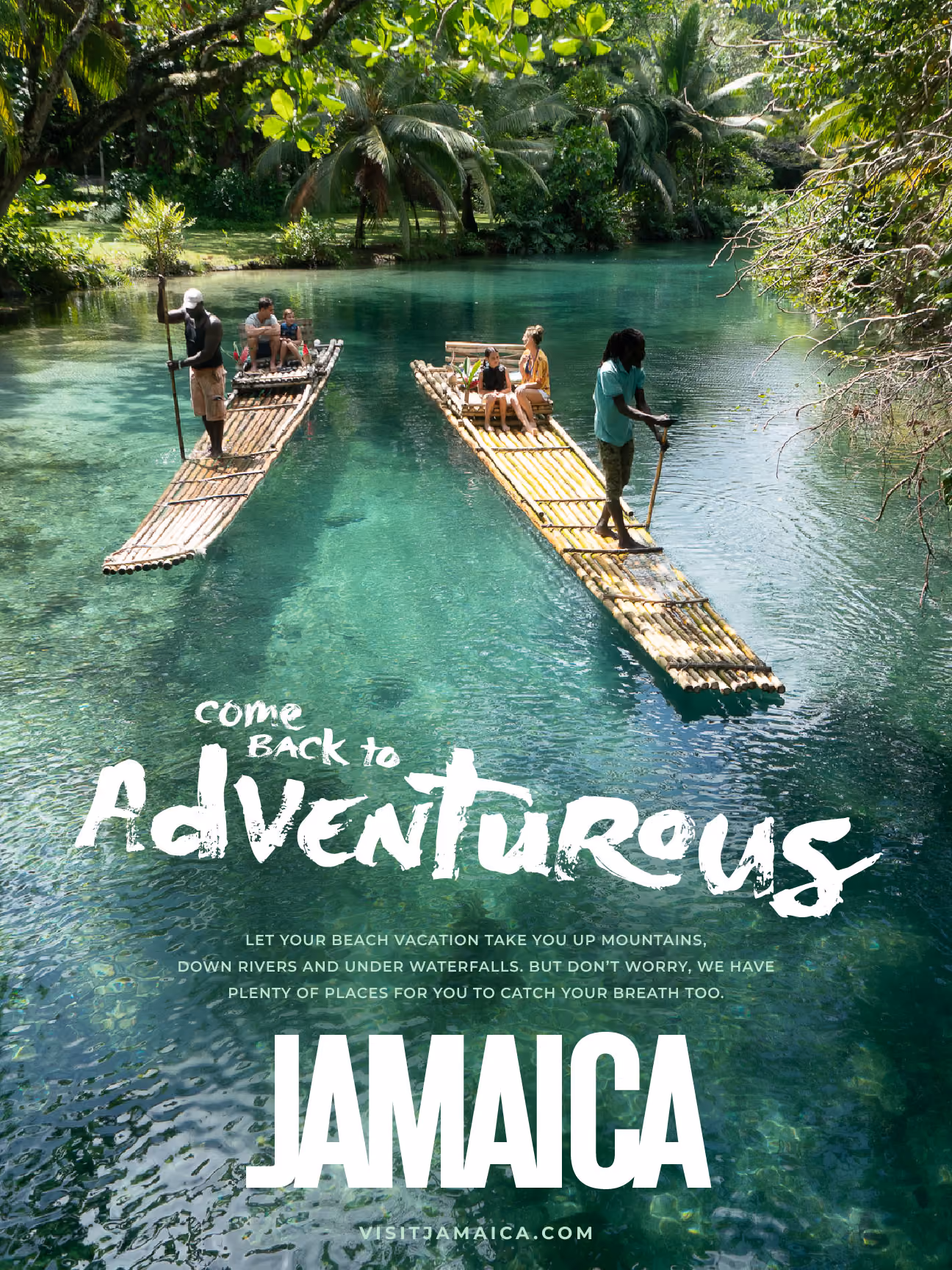 Two bamboo rafts with people floating on clear blue water surrounded by lush tropical greenery.