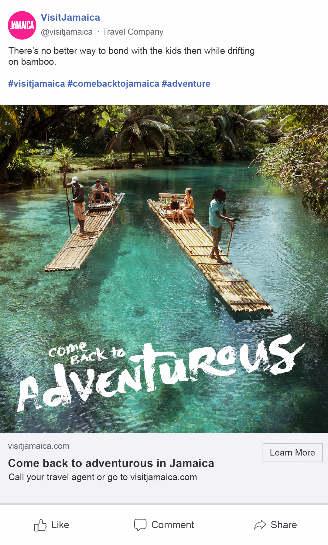 Two bamboo rafts drift on clear turquoise water surrounded by lush tropical greenery in Jamaica.