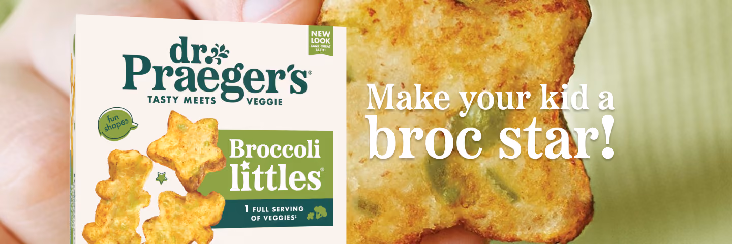 Hand holding a box of Dr. Praeger's Broccoli Littles star-shaped veggie bites with text Make your kid a broc star!