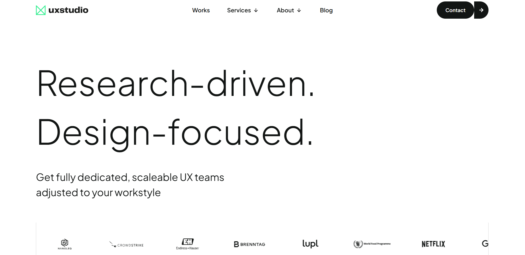 A screenshot of UX studio's clean and minimalist website, which positions them as a research-driven UX design agency