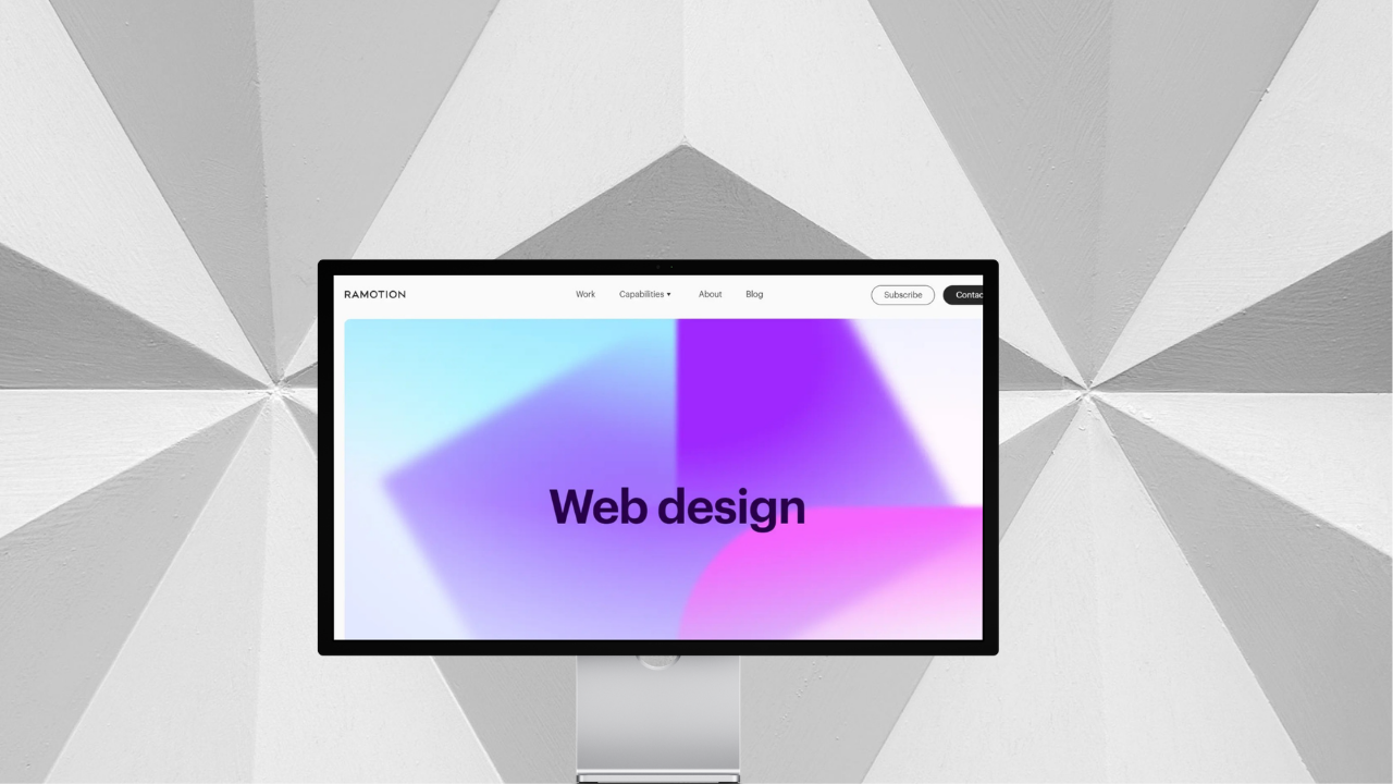 Ramotion's minimalistic website has a straightforward design with abstract, blurred shapes.