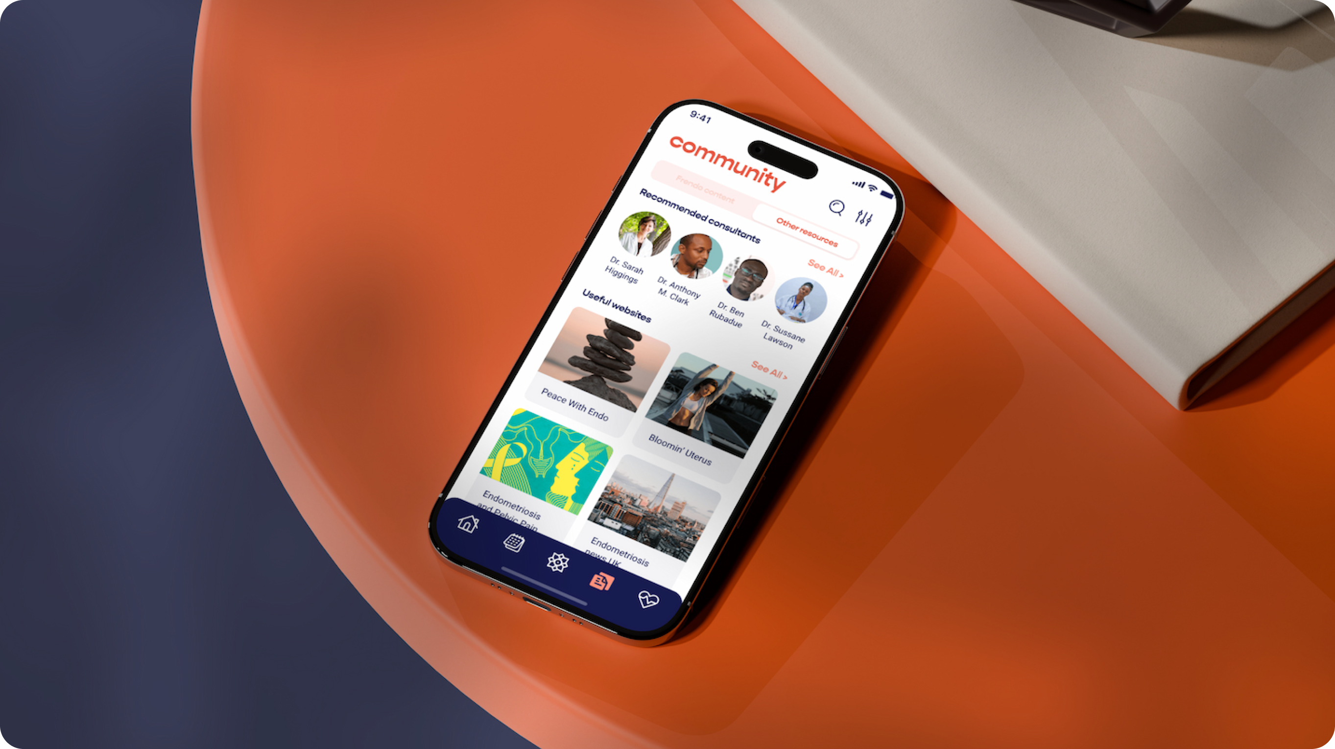 A smartphone on an orange surface displays a healthcare app interface open on a "community" tab, with user profiles, images, and sections for offers and popular posts.