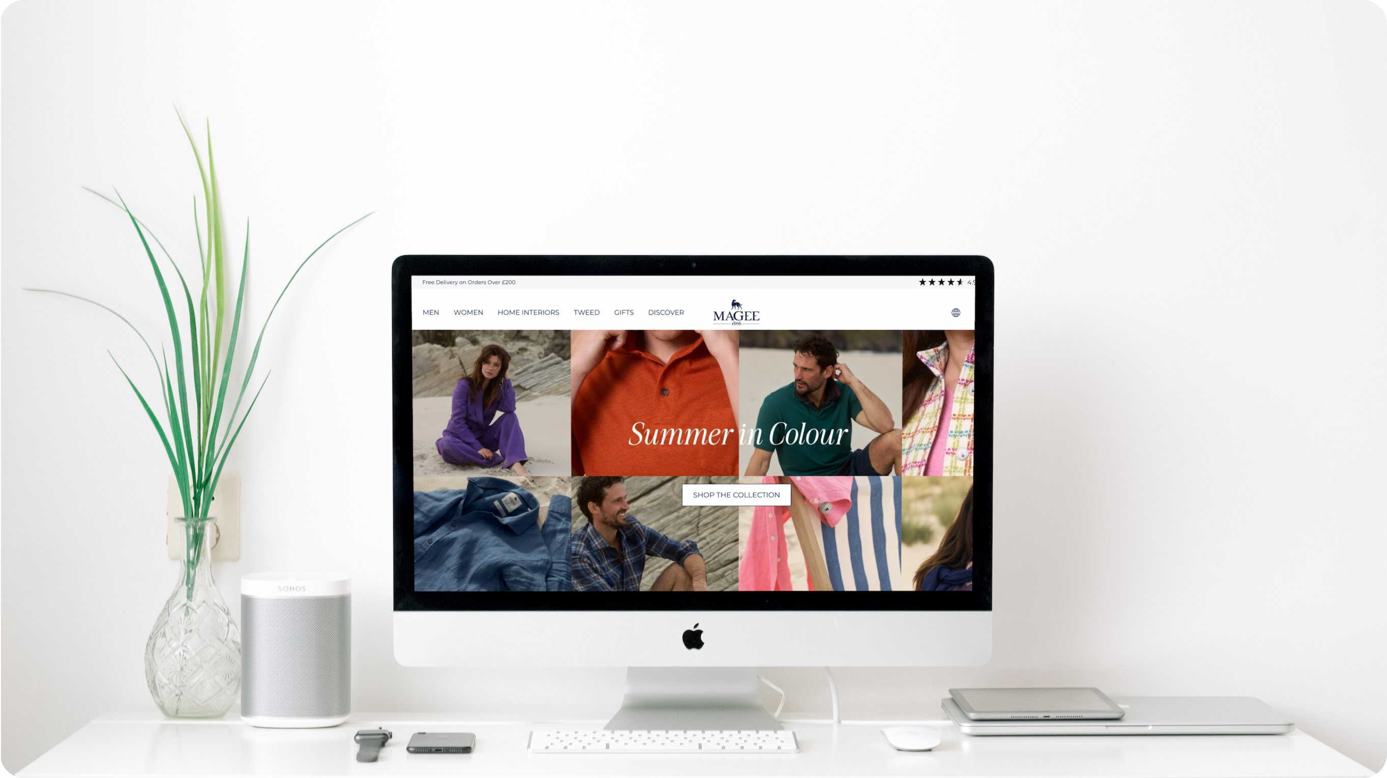 An elegant e-commerce platform featuring a close grid of a "Summer in Colour" fashion selection.