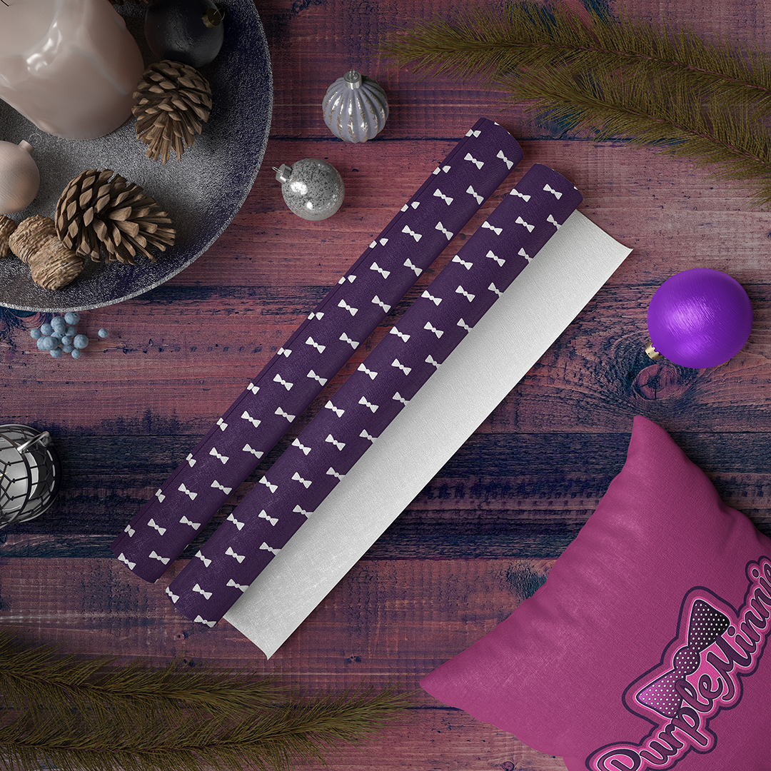 Purple Minnie christmas decoration with a pillow and wrapping paper.