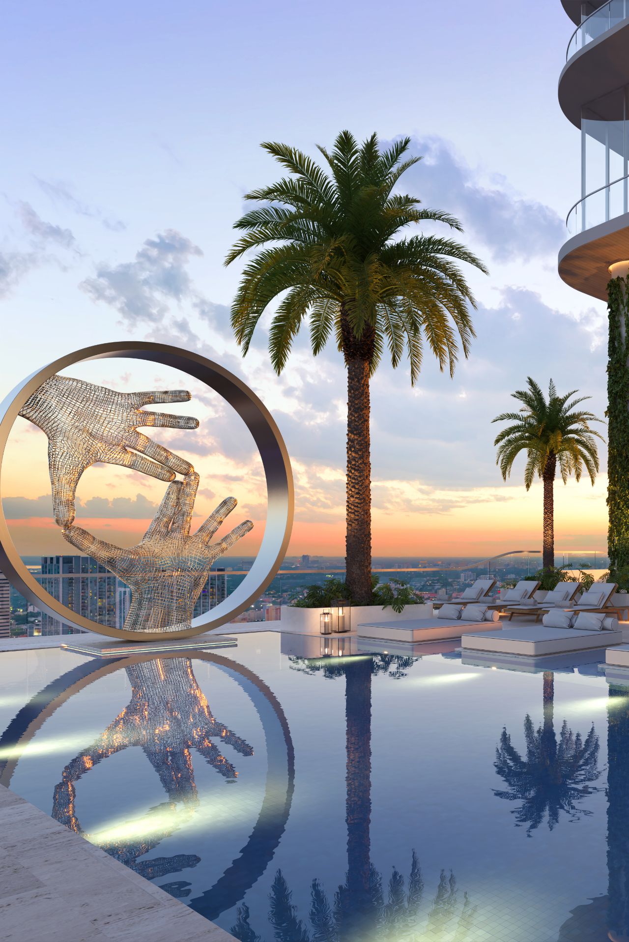 Front view of outdoor Miami pool with outside beds, a sculpture of two hands together