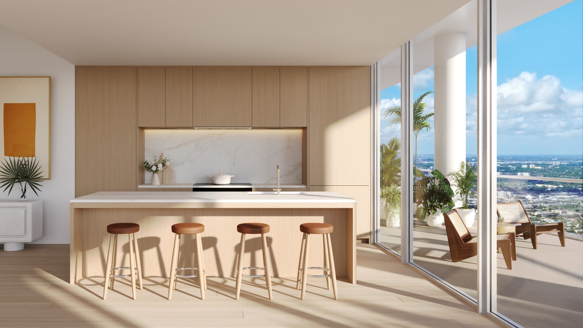 Bright modern kitchen with a light wood island featuring four stools, marble countertop, built-in cabinetry, and large floor-to-ceiling windows overlooking a balcony with plants and city views.