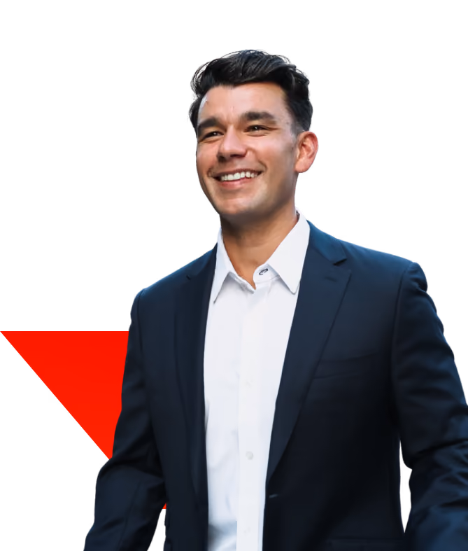 Brian Mayoral of Sell Up, a man in a suit smiling confidently.