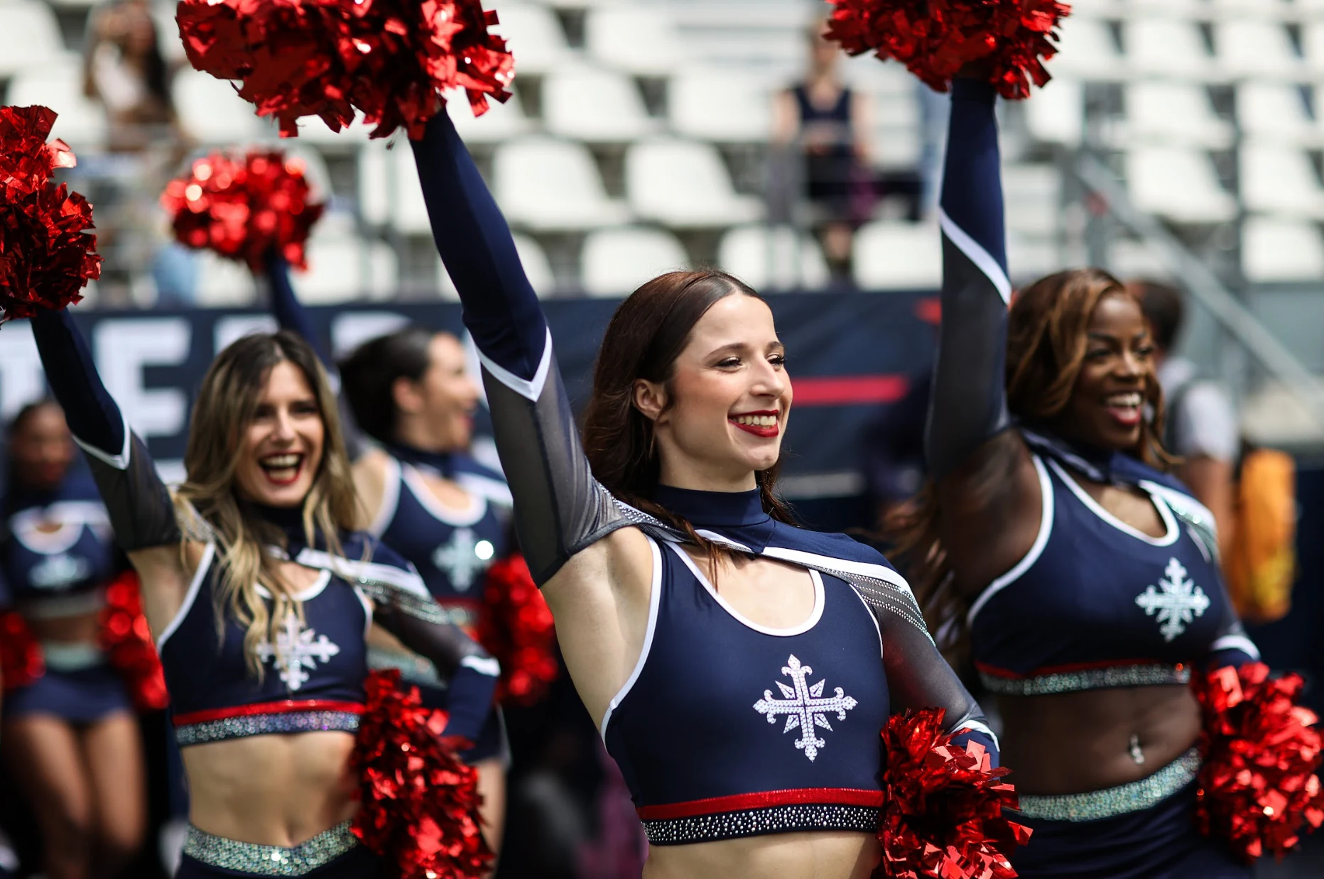 The MuskeCheers performing at a Paris Musketeers game