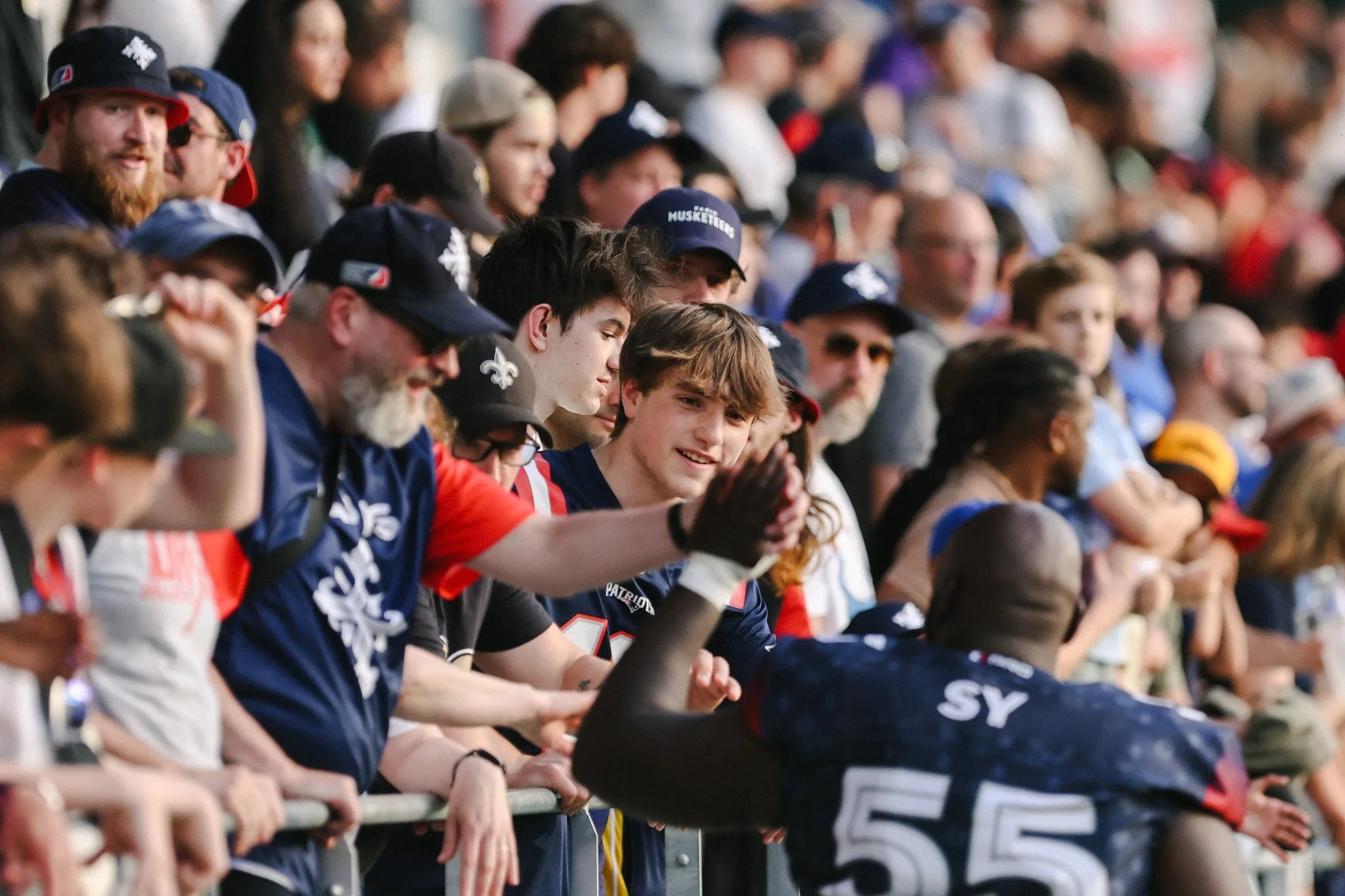 Paris Musketeers player greeting supporters after a game