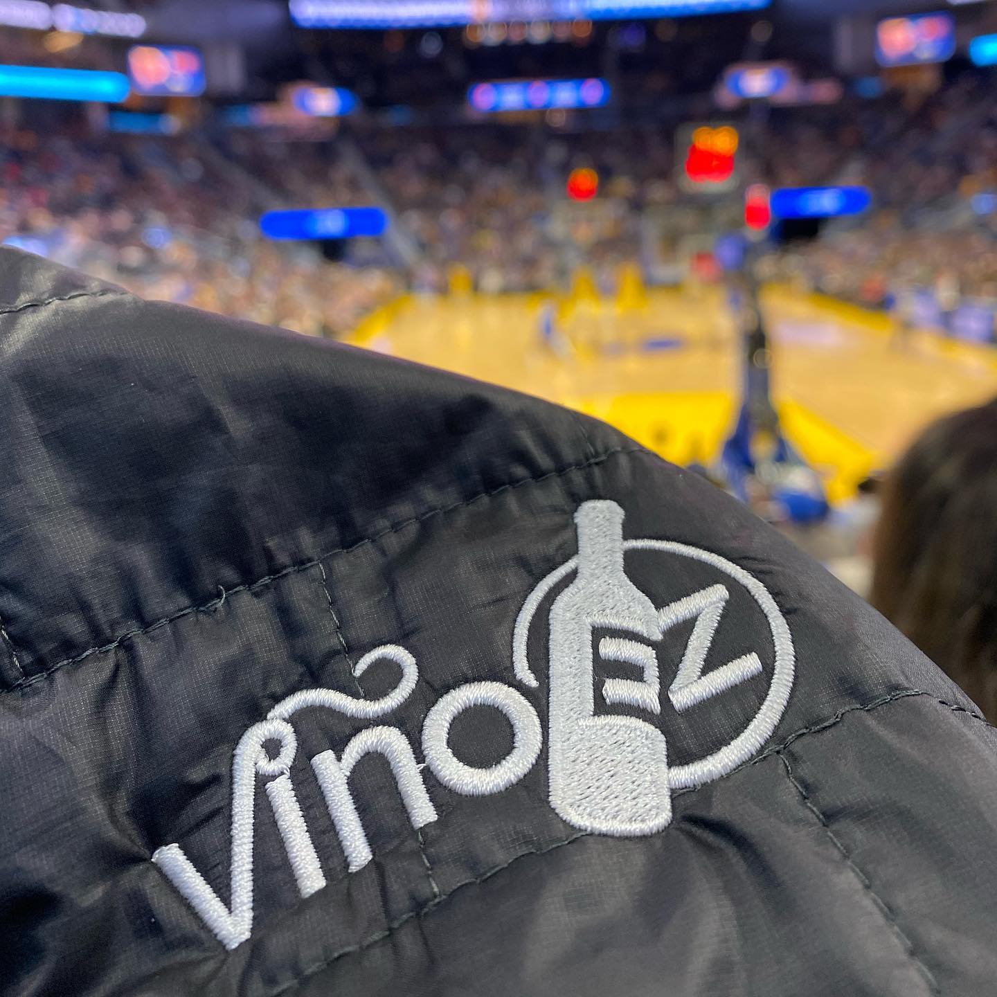 Logo design embroidered onto a windbreaker jacket