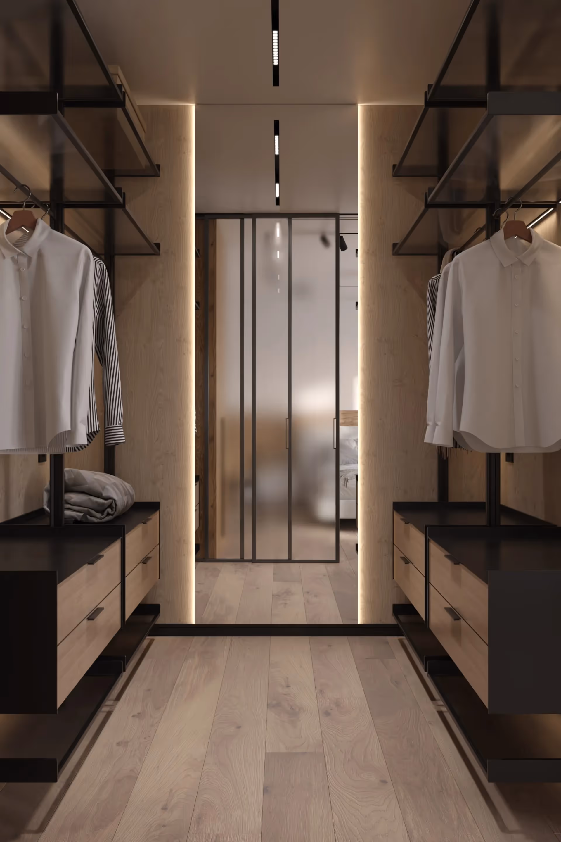 A white shirt hanging in a closet.