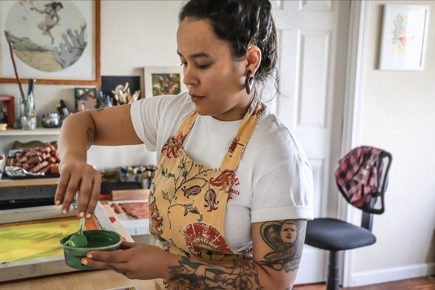 Artist Niki Toney mixing ink in her studio